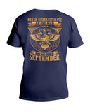 Never Underestimate A September Man T-Shirt - Hoodie - Guys V-Neck