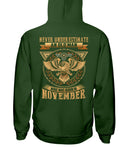 Never Underestimate A November Man T-Shirt - Hoodie - Guys V-Neck